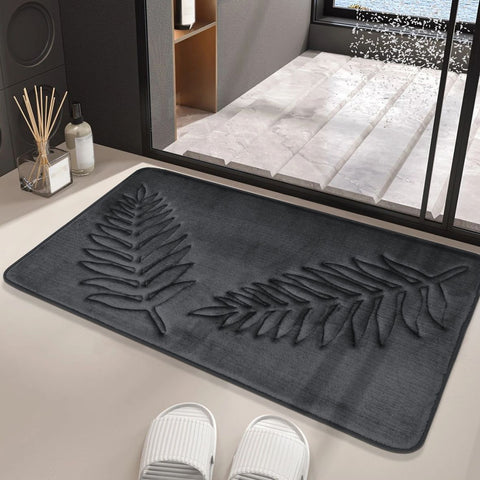 Dark Gray fern-pattern bath mat placed in a modern bathroom near shower and slippers