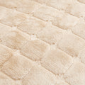 Close-up of a textured beige fabric with a diamond pattern of sofa chair recliner cover