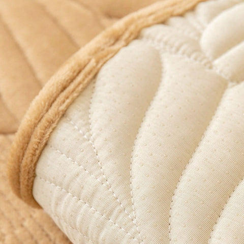 Non-slip backing closeup of plush camel couch protector