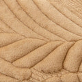 Non-slip backing closeup of plush camel couch protector