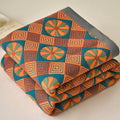Folded view showing double-sided pattern of the quilt