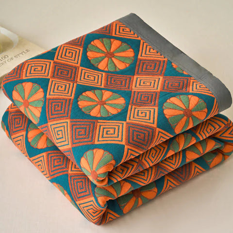 Folded view showing double-sided pattern of the quilt