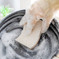 Side view of coconut and wood pulp sponge stack