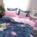 Vivid flamingo duvet cover and matching pillowcases, styled for modern bedroom