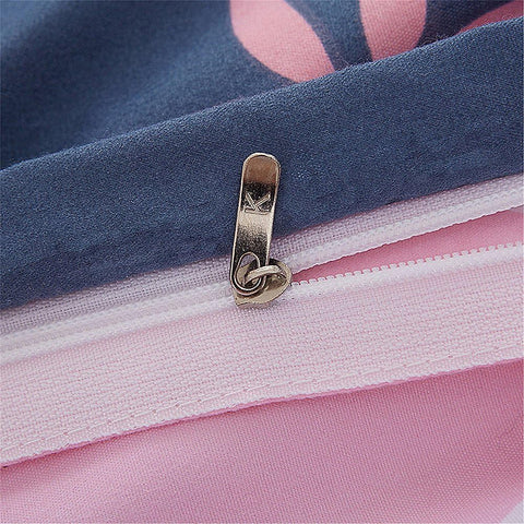 Zipper closure detail on colorful flamingo print duvet cover for easy care