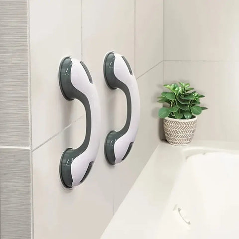 Close-up of suction cup lock mechanism on bathroom support bar


