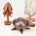 Elmwood folding coasters stacked as decorative tree