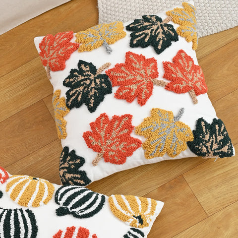 Cozy tufted cushion covers and throw pillows with pumpkin and maple leaves for fall decor