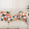 Set of Halloween tufted throw pillows and cushion covers with pumpkin and leaf designs