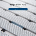 Quick-drain grooves prevent water buildup on bathroom mats