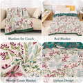 Floral patterned blankets displayed on a couch, bed, and other surfaces with text labels.