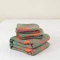 Folded quilt stack showcasing fabric and design