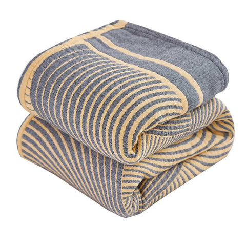 Folded quilt stack showing reversible sides