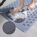 Feet using gray anti-slip mat with built-in foot scrubber and textured grip