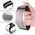 Hand holding a garlic press with close-up details on design and functionality.