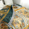 Close-up of Golden Romance Boho throw blanket edges and reversible side showing texture and stitching details.