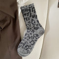 Gray leopard sock flat lay