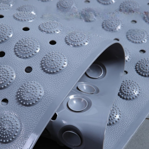 Close-up of anti-slip texture on gray waterproof shower mat