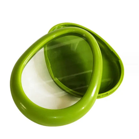Green food pod opened next to empty shell