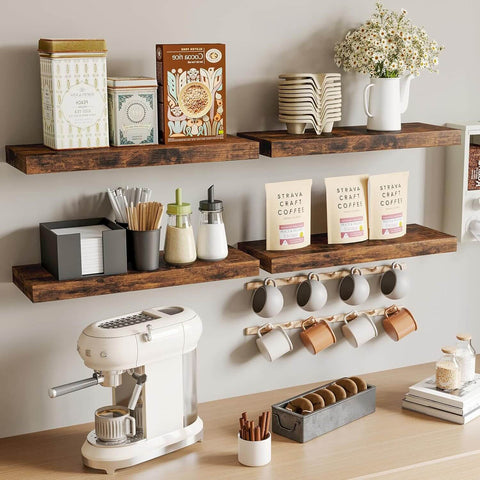 Wall-mounted floating shelves used for kitchen mugs and books
