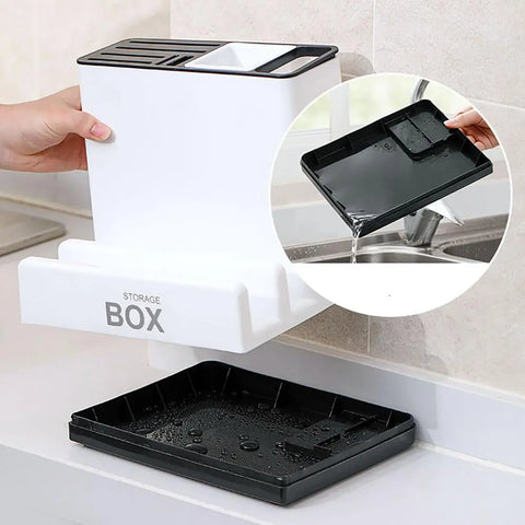 Storage box with a black tray on a kitchen counter, showing a close-up of the tray being rinsed.