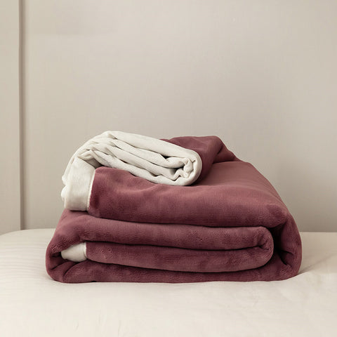 Folded Kumo Harmony Blanket in Purple White showing milk velvet texture