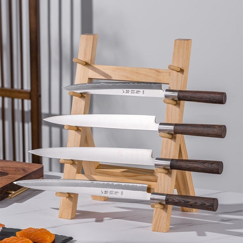 Minimalist knife rack in light wood with chef knives