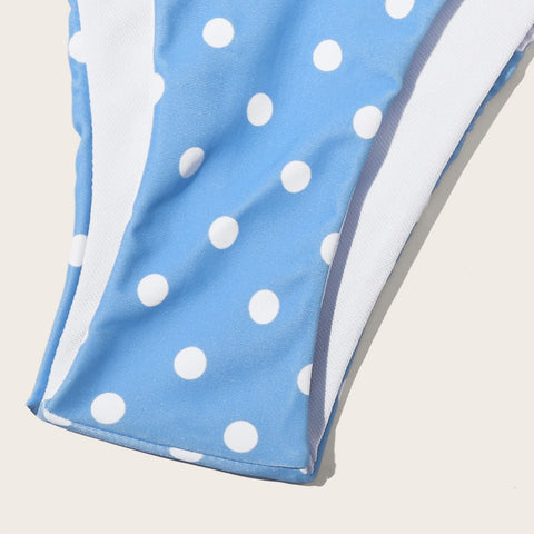 Close-up of bikini bottom showing soft textured blue fabric and white dots