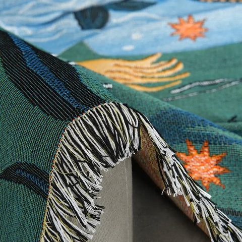 Close-up of woven mermaid blanket showing pattern and texture
