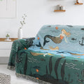  Colorful mermaid blanket styled on a small white sofa