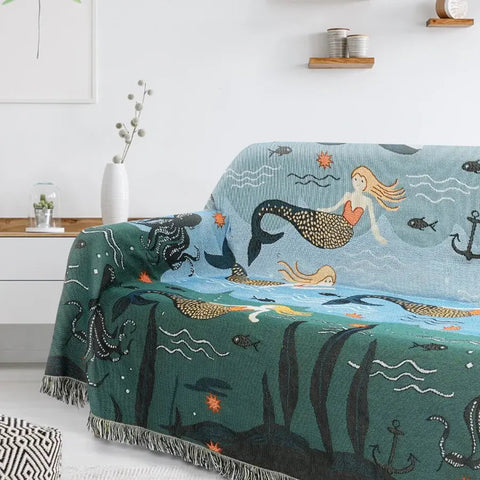  Colorful mermaid blanket styled on a small white sofa