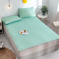 Mint green latex mat set with breakfast tray in bright summer bedroom