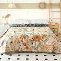  Mirabel floral reversible couch cover blanket styled on bed