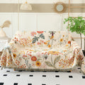 Reversible floral cotton couch cover blanket on living room sofa