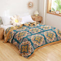 Reversible Moroccan cotton quilt on minimalist white bed