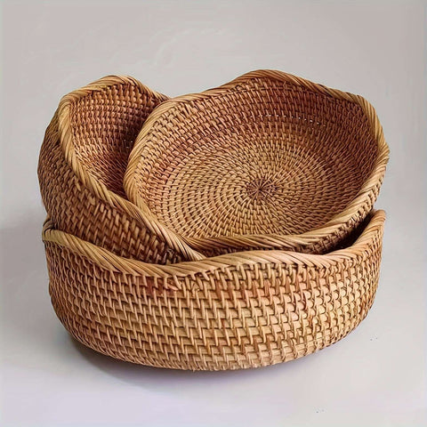 Nested handwoven rattan baskets with natural texture