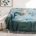 Mermaid-themed couch throw with sea animals in bright living room