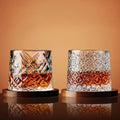 Minimalist photo of two patterned whiskey glasses side by side
