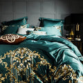 Pillow and duvet detailing with embroidery on emerald base