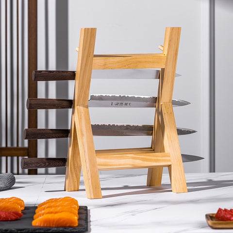 Pine wood knife rack on white counter