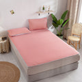 Soft pink latex cooling mat with matching pillowcases in minimal bedroom