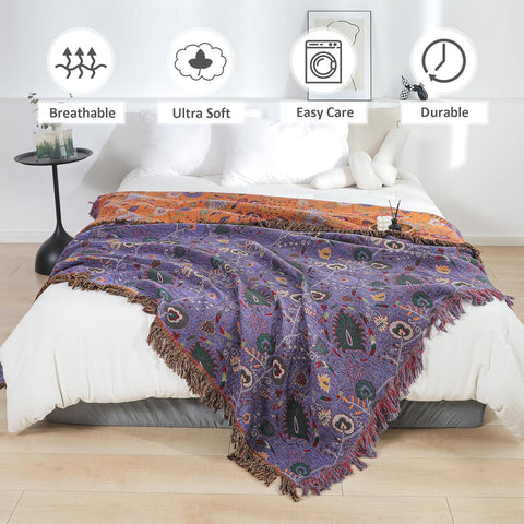 Purple boho cotton throw blanket draped over a bed showing soft, breathable, easy care, and durable features in a bright bedroom setting with white pillows