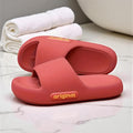 Red slides with 'original' branding on a marble surface with white towels in the background