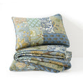 Laid-out view of reversible bohemian cotton quilt showing pattern mix