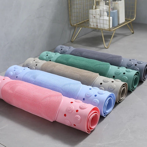Rolled shower mats in five colors: pink, green, gray, blue, purple

