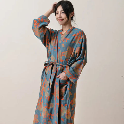 Woman wearing floral cotton gauze kimono robe