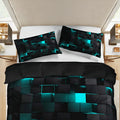 Black and teal geometric patterned bedding set on a bed in a bedroom.