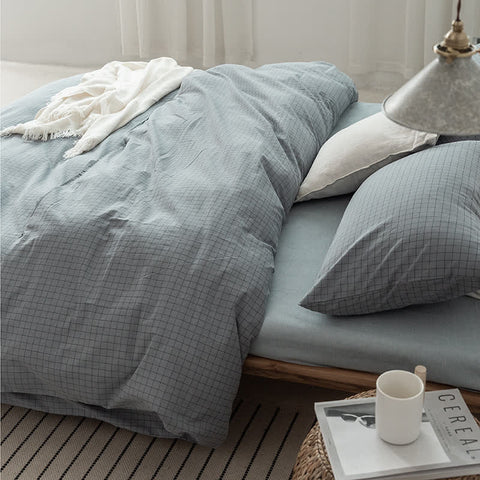 Soft Blue Waffle Bedding Set with Matching Pillows on Minimalist Bed – Fresh and Relaxing Dorm Room Decor