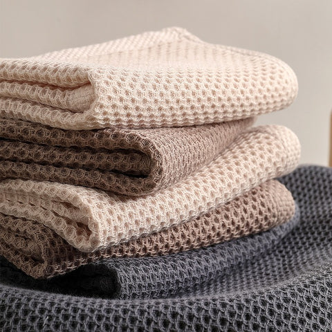 Soft honeycomb towels in beige, brown, and gray colors