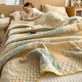 Soft jacquard quilt covering bed with elegant drape